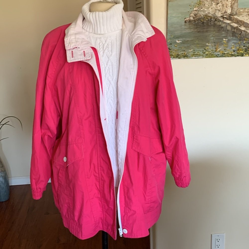 Vibrant pretty in pink, lightweight raincoat jacket, perfect for the Spring